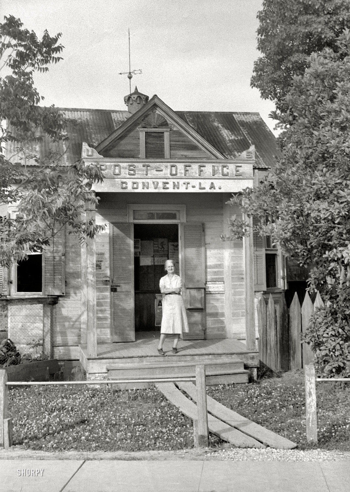 Circa 1939. "Post Office in Convent, Louisiana." 35mm nitrate negative by John Vachon for the Farm Security Administration. View full size.