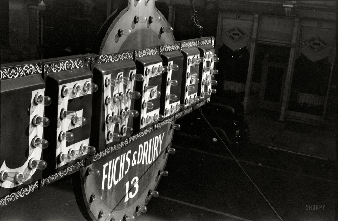 October 1941. Chillicothe, Ohio. "Jewelers sign." 35mm nitrate negative by John Vachon for the Farm Security Administration. View full size.