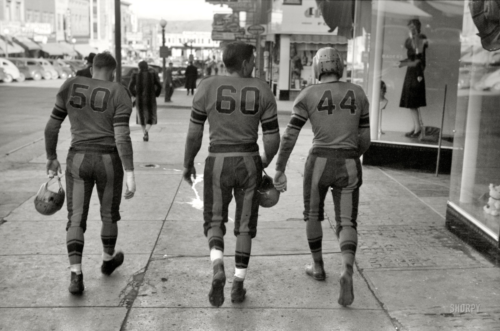 October 1940. "Football players. Minot, North Dakota." 35mm nitrate negative by John Vachon for the Farm Security Administration. View full size.