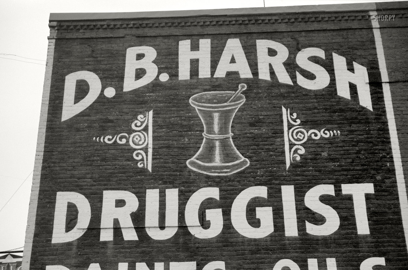 November 1940. "Drug store in Seneca, Kansas." In need of a mild laxative? Something to soothe that upset tummy? Sorry, no can do. 35mm nitrate negative by John Vachon for the Farm Security Administration. View full size.