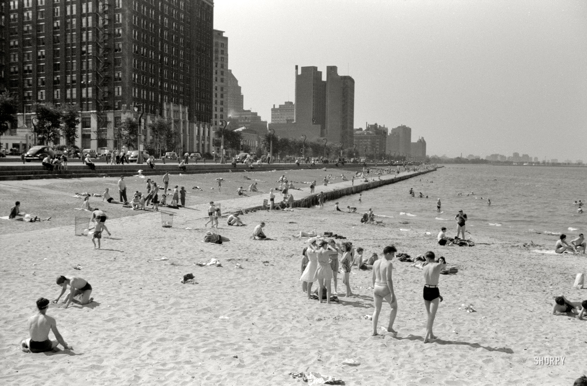 Chicago, July 1941. "Ohio Street bathing beach, Lake Michigan." 35mm nitrate negative by John Vachon for the Farm Security Administration. View full size.
