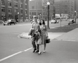 "Michigan Avenue, Chicago, July 1941." And just a block ago, they were strangers. 35mm negative by John Vachon, who has a lens for the ladies. View full size.