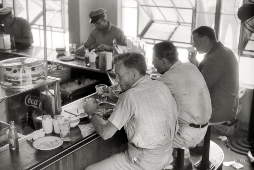June 1940. Washington, D.C. "In the cafe at a truck drivers' service station on U.S. 1 (New York Avenue)." 35mm negative by Jack Delano. View full size.
