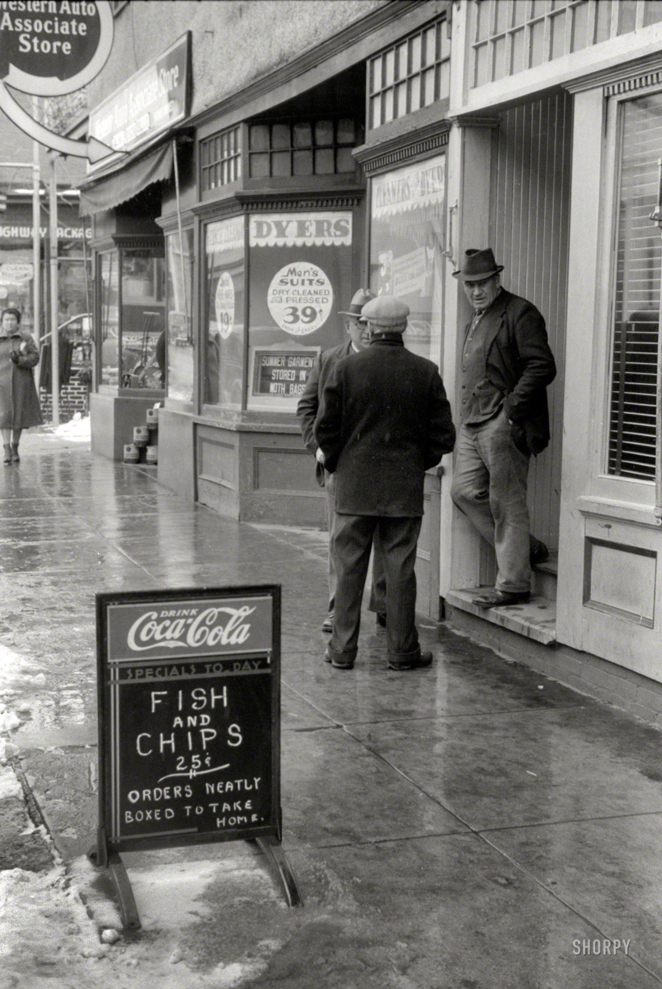November 1940. "Men outside of a beer parlor in Jewett City, Connecticut." 35mm nitrate negative by Jack Delano. View full size.