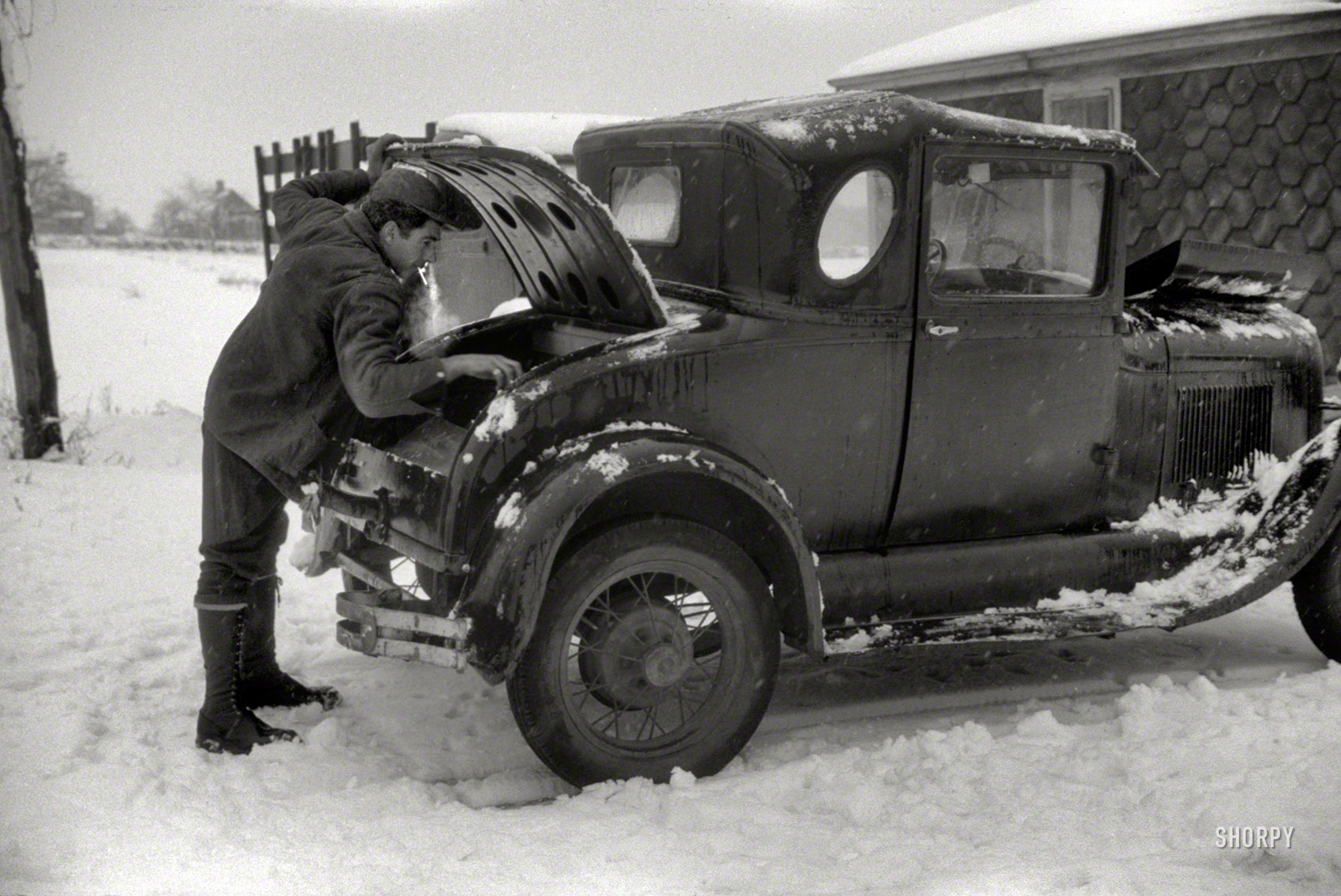 December 1940. "The son of Mr. John Rambone, Italian market gardener getting ready for a trip into town. Johnston, Rhode Island." Let the automotive discussion begin! 35mm nitrate negative by Jack Delano. View full size.