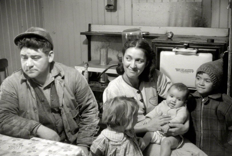 December 1940. "Family of Dennis Decosta, Portuguese Farm Security Administration client who owns 12 cows on a small farm in Little Compton, Rhode Island." 35mm nitrate negative by Jack Delano. View full size.
