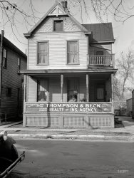 December 1935. "House in Cincinnati showing its conversion into businesses and blight." Photo by Carl Mydans, Resettlement Administration. View full size.