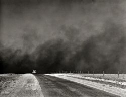 March 1936. "Heavy black clouds of dust rising over the Texas Panhandle" — evidence of the forces that were driving thousands of farm families in Texas and Oklahoma to the West Coast in the great Dust Bowl migration chronicled in "The Grapes of Wrath." Medium format negative by Arthur Rothstein. View full size.