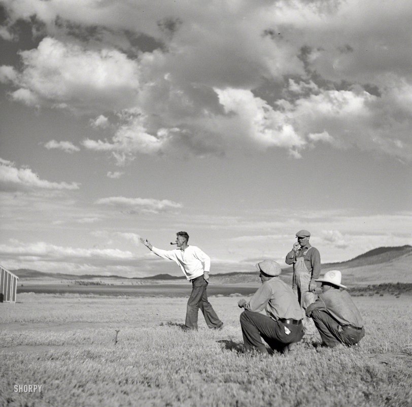 July 1936. "Pitching horseshoes at the Resettlement Administration camp. Madras, Oregon." Photo by Arthur Rothstein. View full size.
