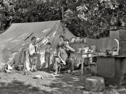 July 1936. "Family of migratory fruit workers. Yakima, Washington." Photo by Arthur Rothstein for the Resettlement Administration. View full size.