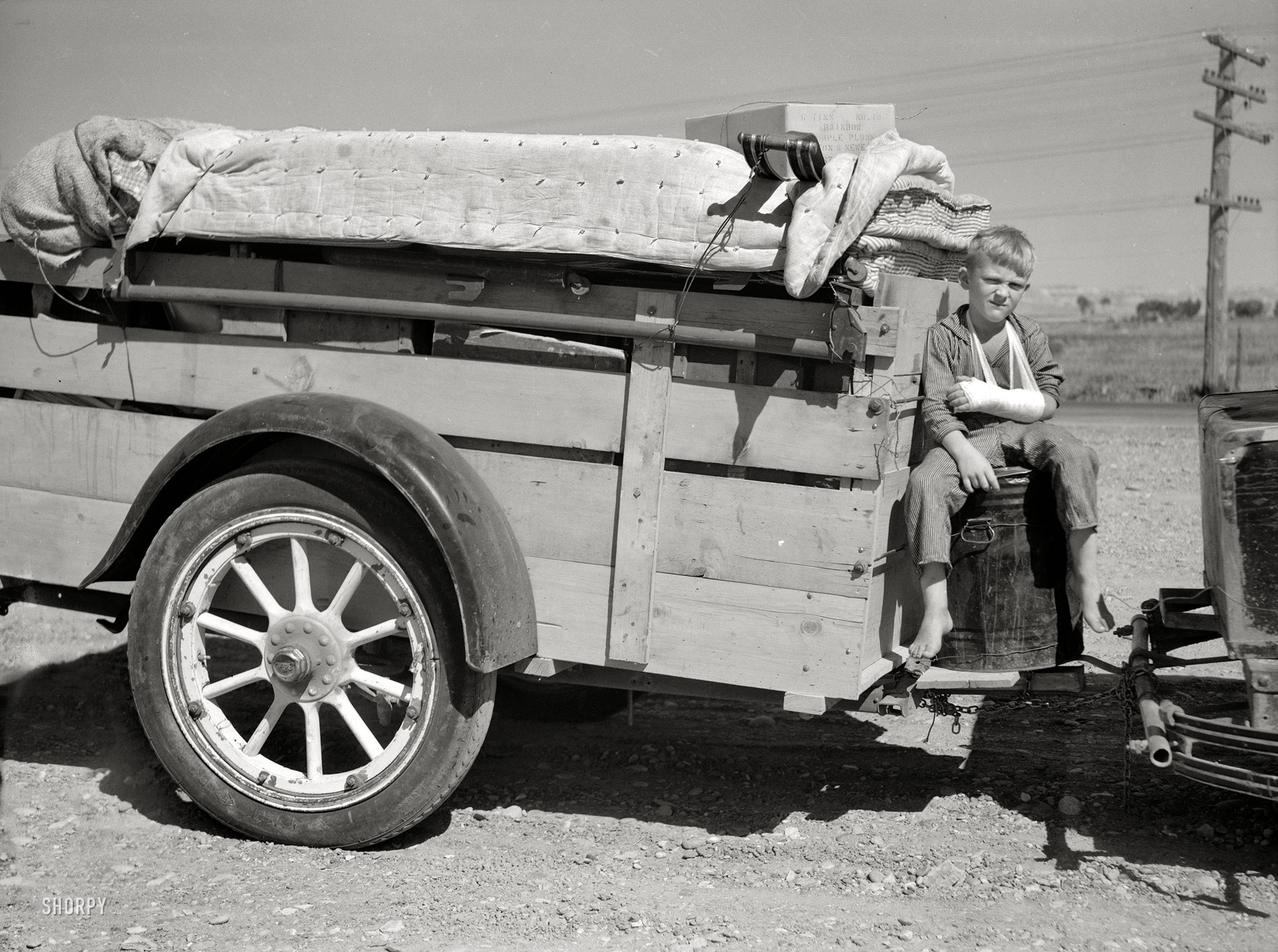 July 1936. "Drought refugees from North Dakota in Montana." The lad last seen here getting a drink. 3¼ x 4¼ negative by Arthur Rothstein. View full size.