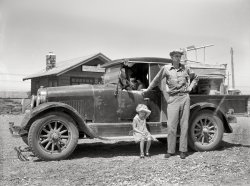 July 1936. "Drought refugees. North Dakota farm family moving to Idaho at port of entry near Miles City, Montana." Medium-format nitrate negative by Arthur Rothstein for the Resettlement Administration. View full size.