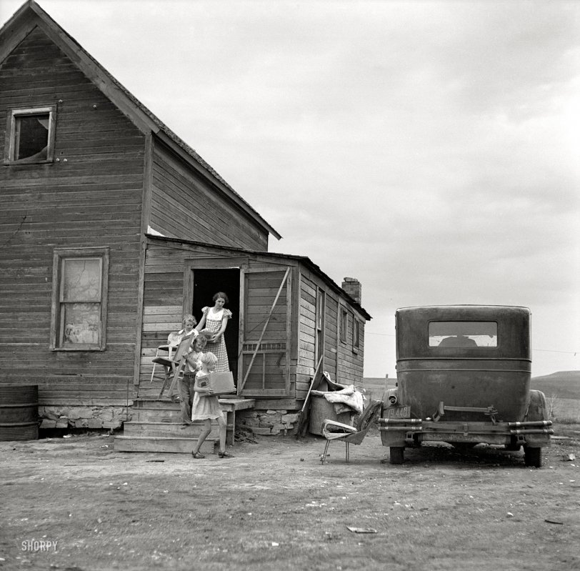 July 1936. "Drought area of North Dakota. Family leaving drought-stricken farm for Oregon or Washington." Medium-format nitrate negative by Arthur Rothstein for the Resettlement Administration. View full size.
