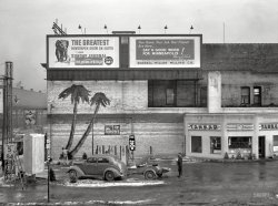 December 1937. "Gas station in Minneapolis." The Minnesota tropics, where snow dusts the painted palms. Photo by John Vachon. View full size.