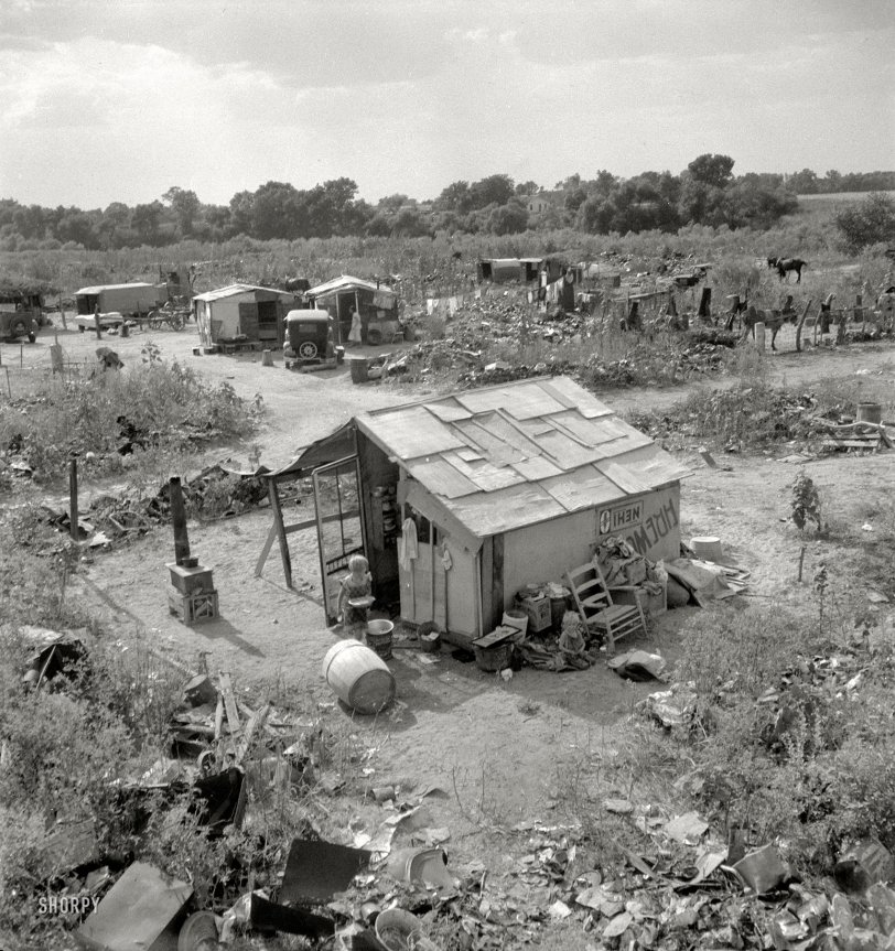 August 1936. "People living in miserable poverty. Elm Grove, Oklahoma County, Oklahoma." A good (or bad) example of the Depression-era shantytowns known as Hoovervilles. Medium-format negative by Dorothea Lange. View full size.
