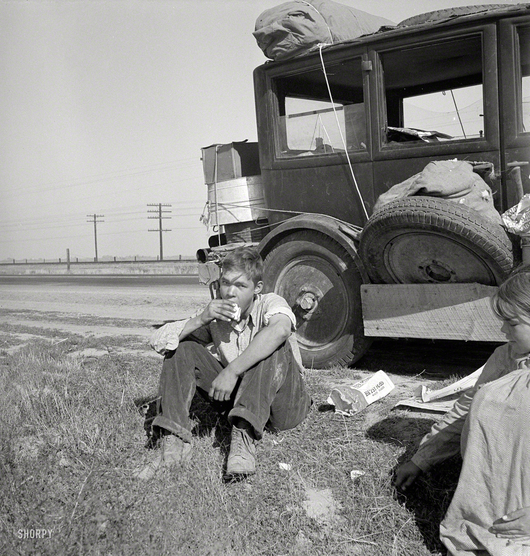 November 1936. Continuing the story of Mama's family. "Depression refugee family from Tulsa, Oklahoma. Arrived in California June 1936. Mother and three half-grown children; no father. Says the mother: 'Anybody wants to work can get by. But if a person loses their faith in the soil like so many of them back there in Oklahoma, then there ain't no hope for them. We're making it all right here, all but for the schooling, 'cause that boy of mine, he wants to go to the University'." Photo by Dorothea Lange for the Resettlement Administration. View full size.