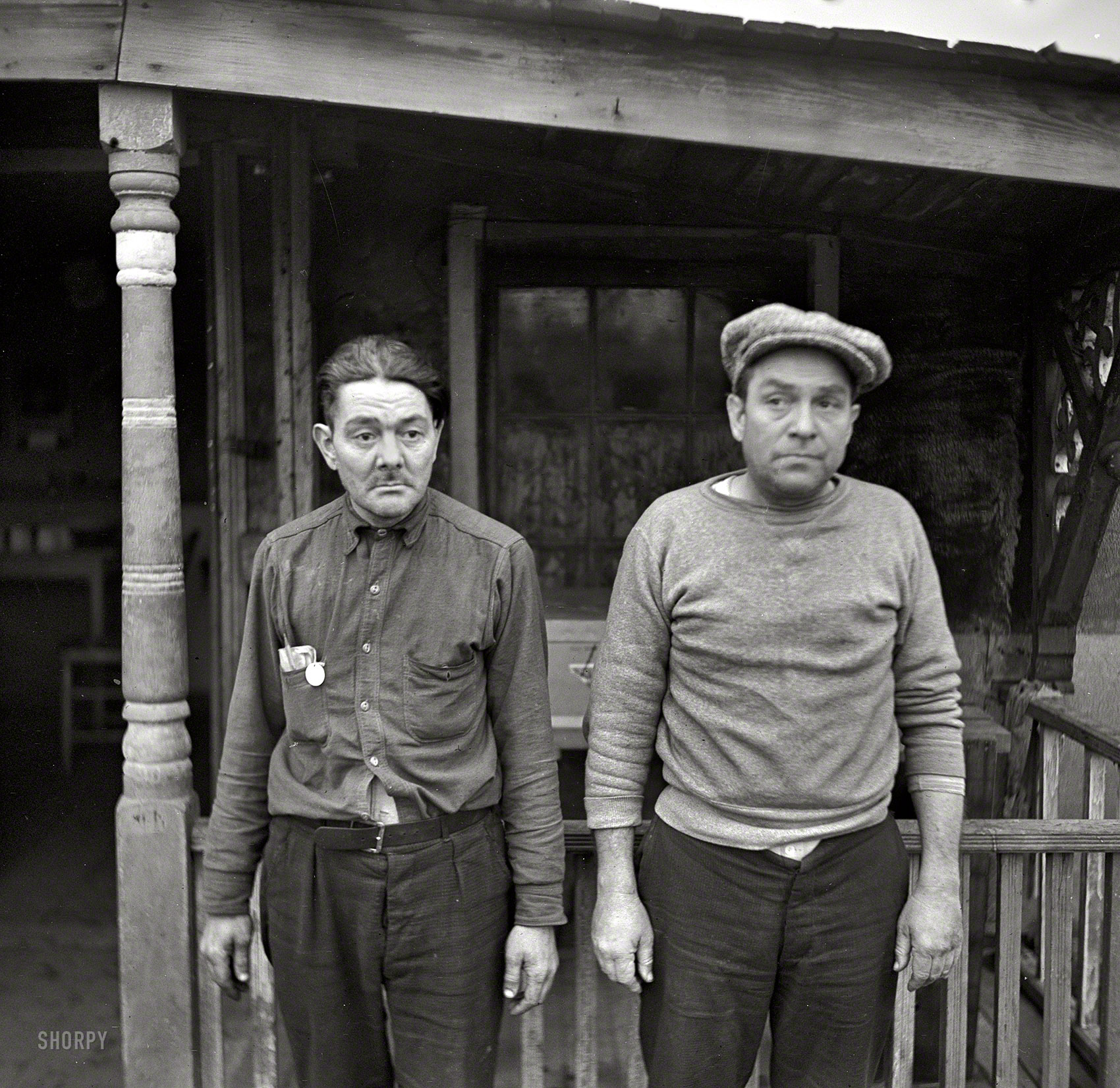 January 1937. Ottawa, Illinois. "Two types living along the waterfront." Photo by Russell Lee for the Resettlement Administration. View full size.