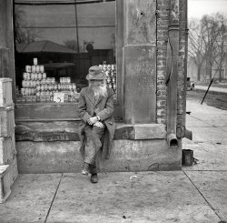 April 1937. "Old man on the street in Shawneetown, Illinois." Cornering the market. Medium-format nitrate negative by Russell Lee. View full size.