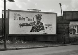 1941. "Billboard in Windber, Pennsylvania." Republican political sentiment from the 1940 presidential campaign, annotated by passers-by. Poster illustration by Howard Scott; FSA photo attributed to "Brown." View full size.