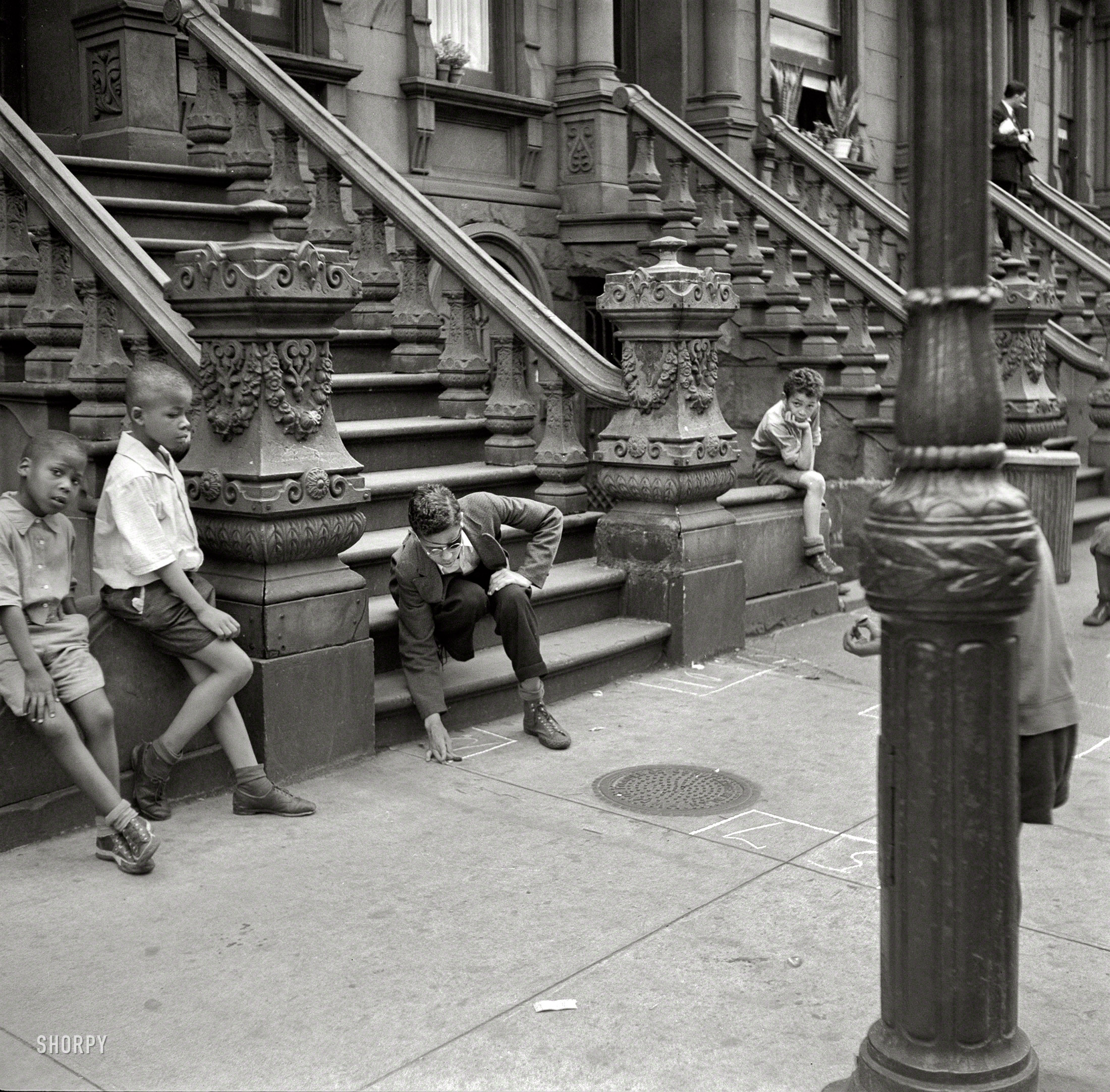 Summer 1938. "New York street scene -- boys playing." Photo by Jack Allison for the Resettlement Administration. View full size.