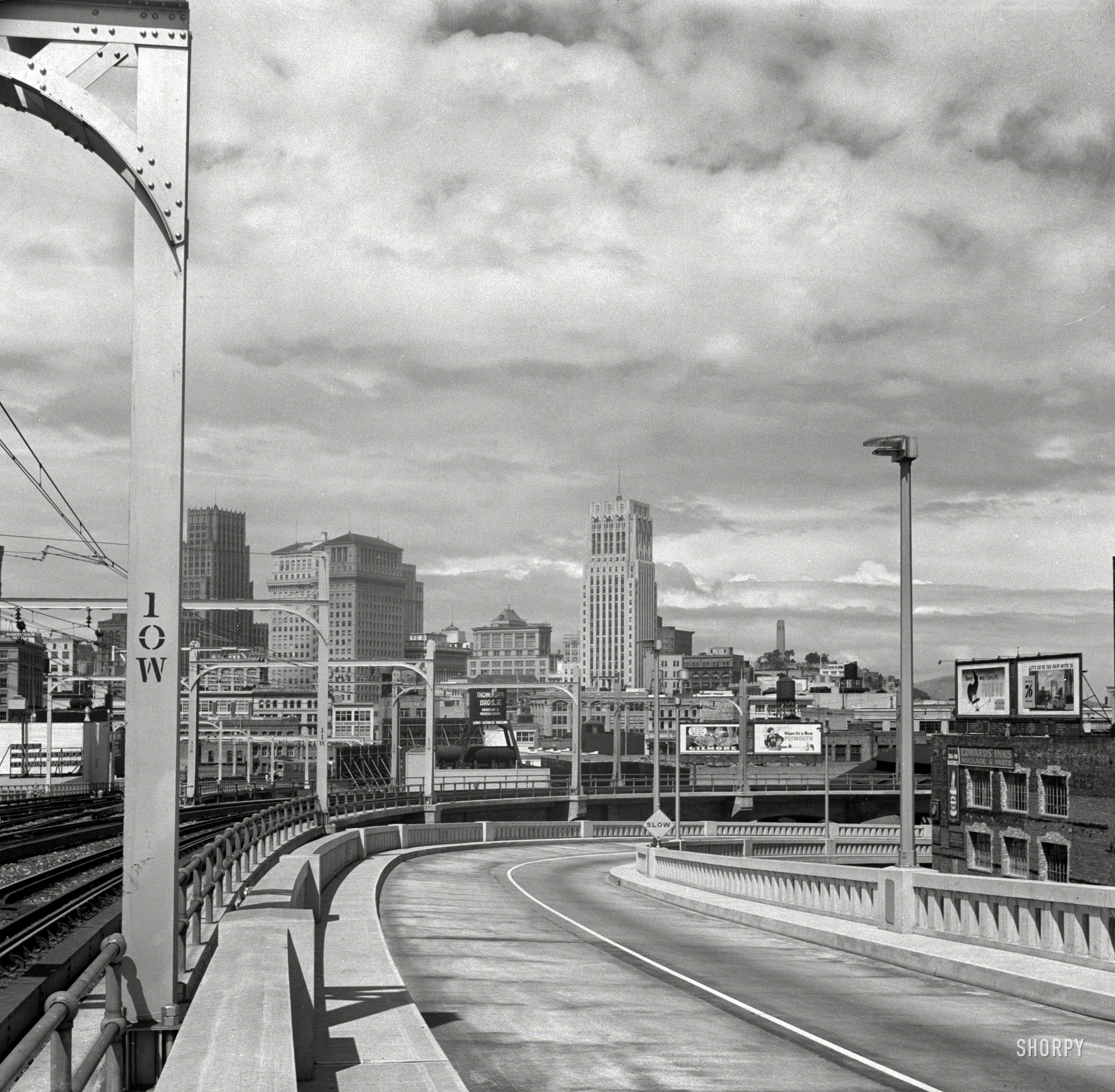 April 1939. "San Francisco, California, seen from the First Street ramp of the San Francisco-Oakland Bay Bridge." Photo by Dorothea Lange. View full size.