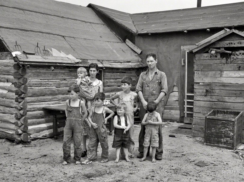 June 1937. "Art Simplot and family in front of their house near Black River Falls, Wisconsin." The prolific Russell Lee shoots the prolific Simplots. View full size.
