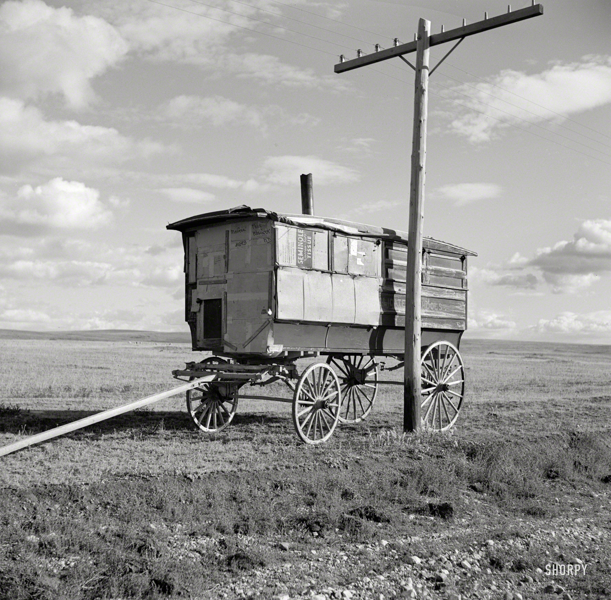 October 1937. "Old school bus. Williams County, North Dakota." Medium-format negative by Russell Lee for the Farm Security Administration. View full size.