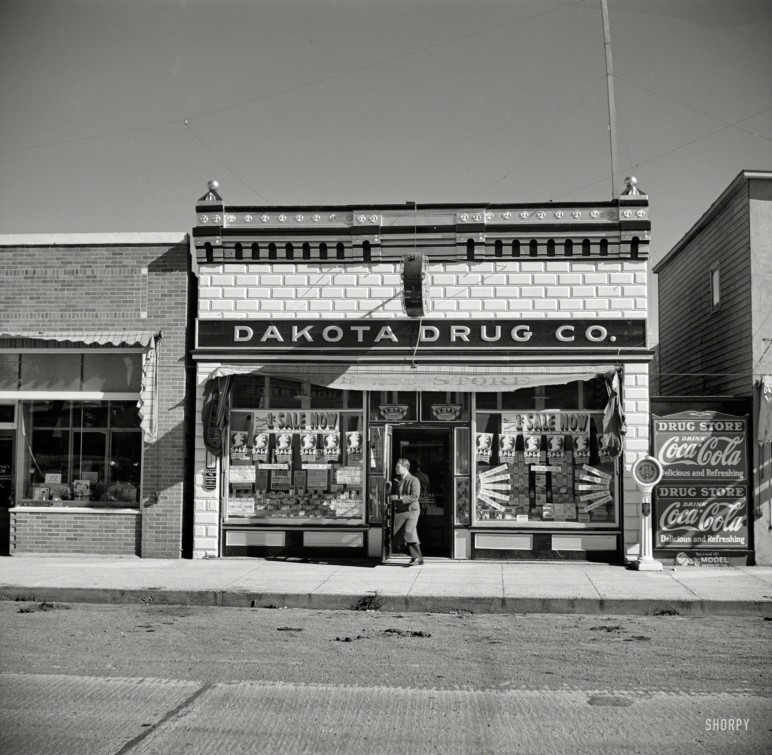 October 1937. "Drug store. Stanley, North Dakota." Medium-format nitrate negative by Russell Lee for the Resettlement Administration. View full size.