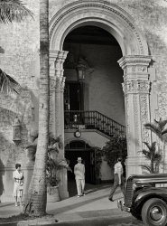 April 1939. "Collins Avenue. Entrance to one of Miami Beach's better hotels." Medium format negative by Marion Post Wolcott for the Farm Security Administration. View full size.