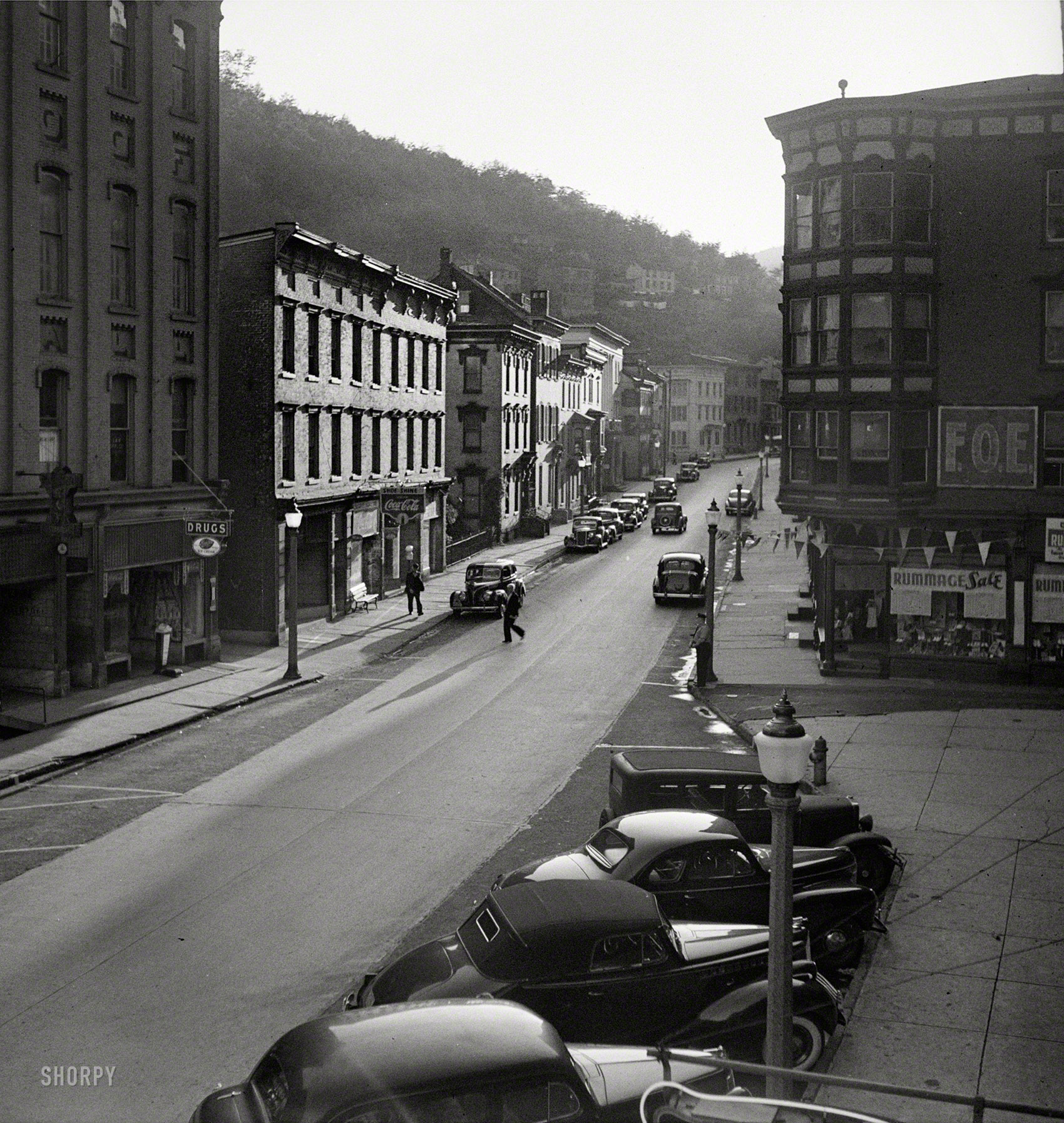 August 1940. "Street scene in Mauch Chunk, Pennsylvania." Paging Edward Hopper. Medium-format negative by Jack Delano. View full size.