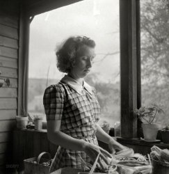 August 1940. "One of the Reitz children on the family farm near Falls Creek, Pennsylvania." Sister of this girl. Photo by Jack Delano. View full size.
Possibly Anna P. Reitz, Age 16 at the time of the 1940 U.S. Census. Daughter of Ralph (54) and Myrtle Reitz (50), with siblings William (14),  Lord (12), Charles (10) and Mary (8). 
(The Gallery, Jack Delano)