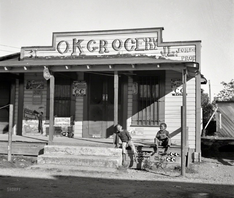 January 1939. "Grocery store in Negro section. Homestead, Florida." Photo by Marion Post Wolcott for the Farm Security Administration. View full size.
