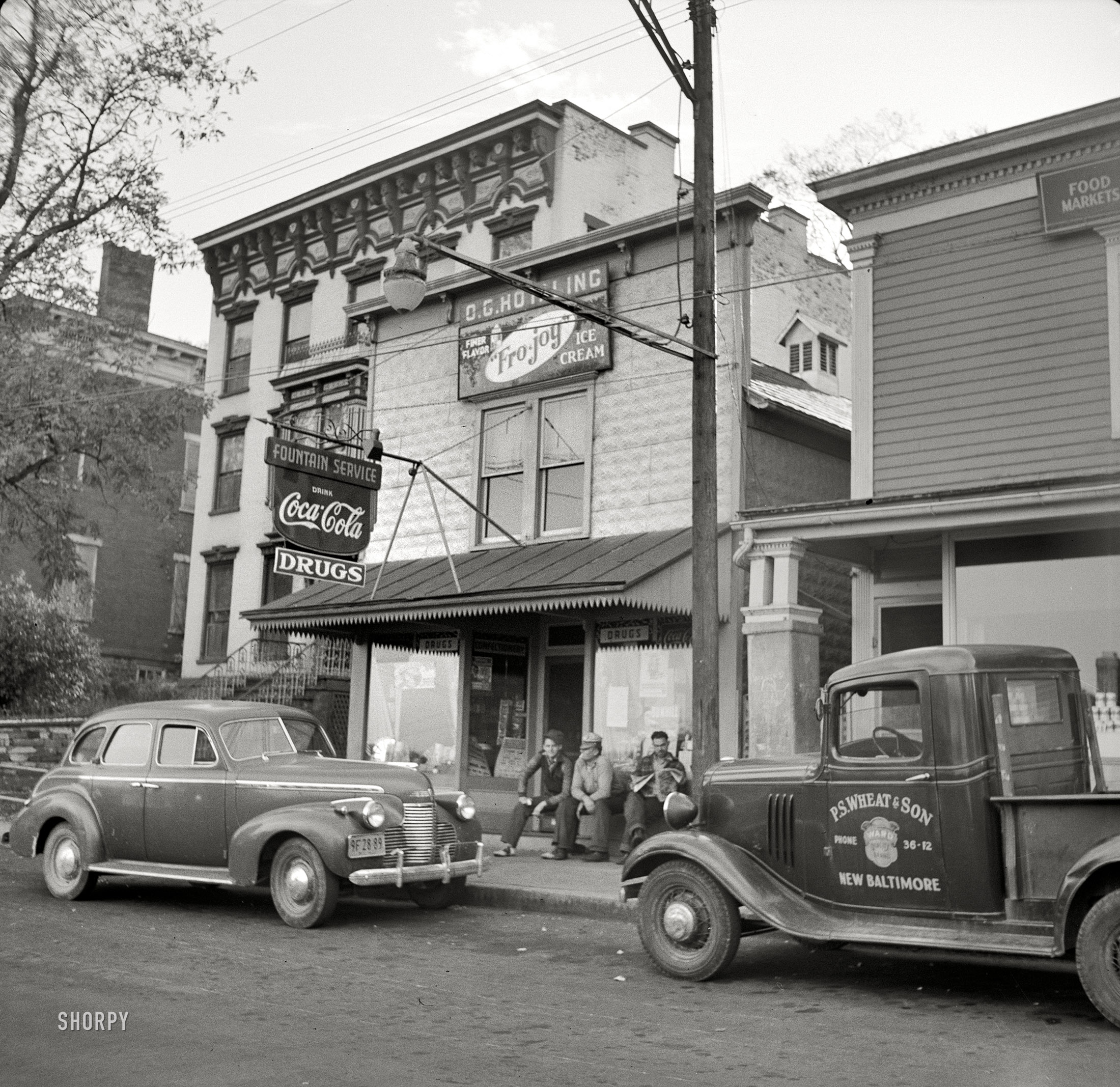 October 1941. "Street scene in New Baltimore on the Hudson, New York." Medium-format nitrate negative by John Collier. View full size.