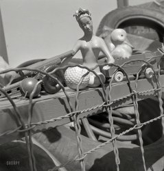 June 1942. Washington, D.C. "Rubber salvage display at Georgia Avenue filling station." Starring Rubber Ducky and Chiquita Banana. This would have made a nice Kodachrome. Photo by Marjory Collins for the OWI. View full size.