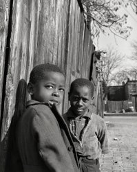 November 1942. Washington, D.C. "Southwest section. Two Negro boys." Large format negative by Gordon Parks, Office of War Information. View full size.