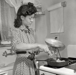 March 1942. "Jewel Mazique cooking dinner after a hard day's work in the Library of Congress." Helping to lay the groundwork for Shorpy, perhaps. Large-format negative by John Collier for the Office of War Information. View full size.