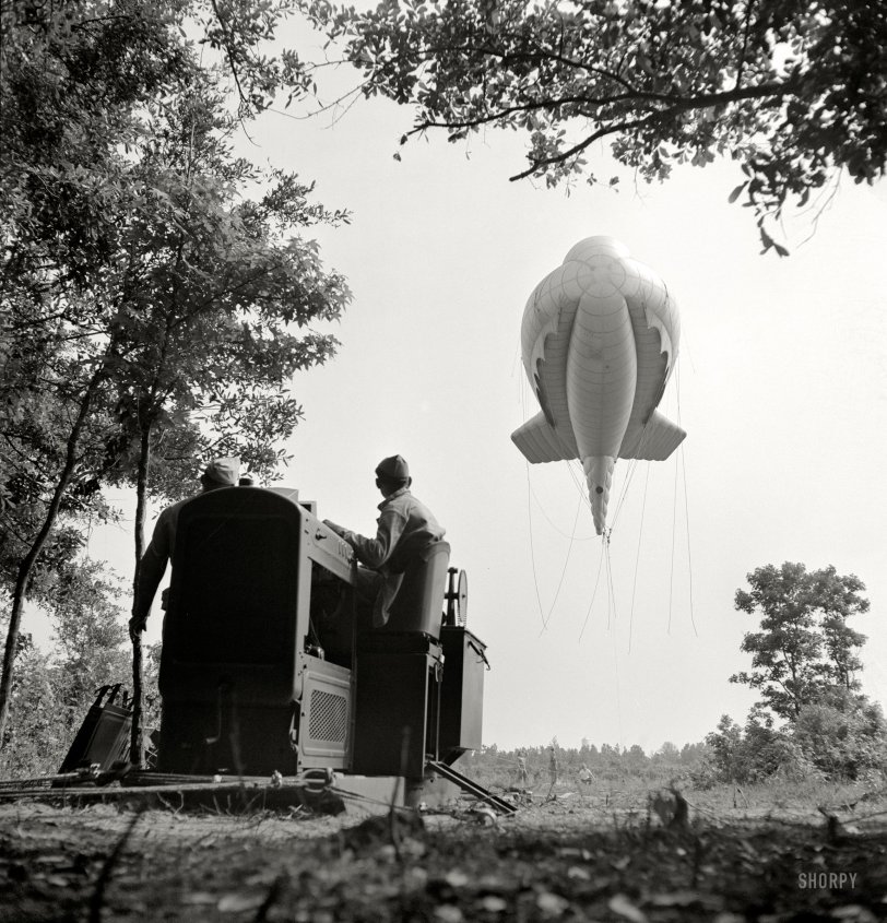 May 1942. "Parris Island, South Carolina. Tactical formations of barrage balloons prevent dive bombing and the strafing of important ground installations. The Leathernecks are developing an excellent technique in this method of protecting important locations from enemy aircraft." Photos by Alfred Palmer and Pat Terry for the Office of War Information. View full size.

