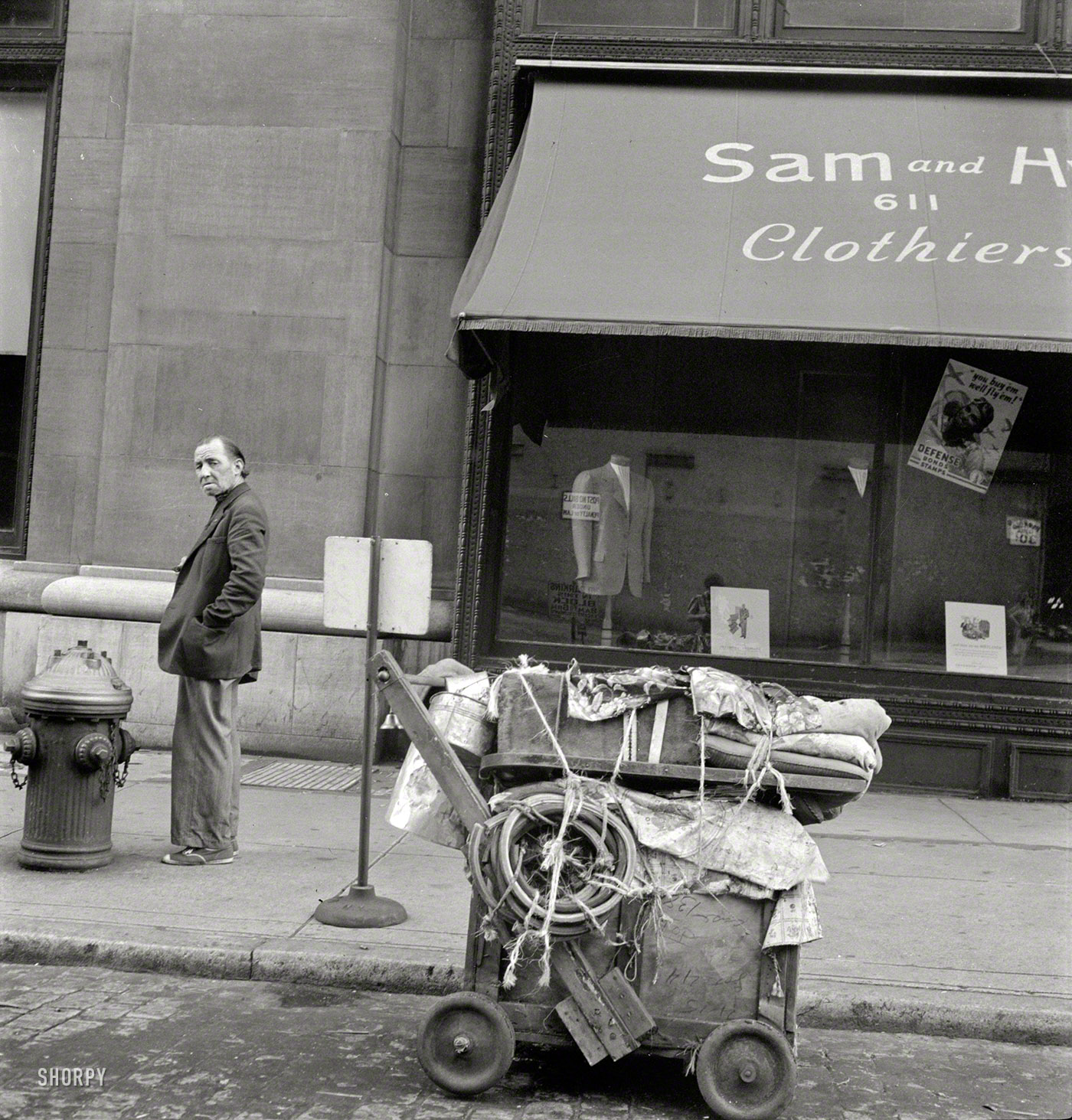 New York, 1942. "Street vagrant pushcart." Who'll be first to pinpoint the location? Photo by Marjory Collins for the Office of War Information. View full size.