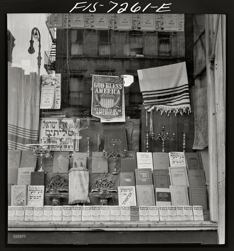 August 1942. "Window of a Jewish religious shop on Broome Street." We'll take a calendar and two cans of Magic, please. Medium format nitrate negative by Marjory Collins for the Office of War Information. View full size.
