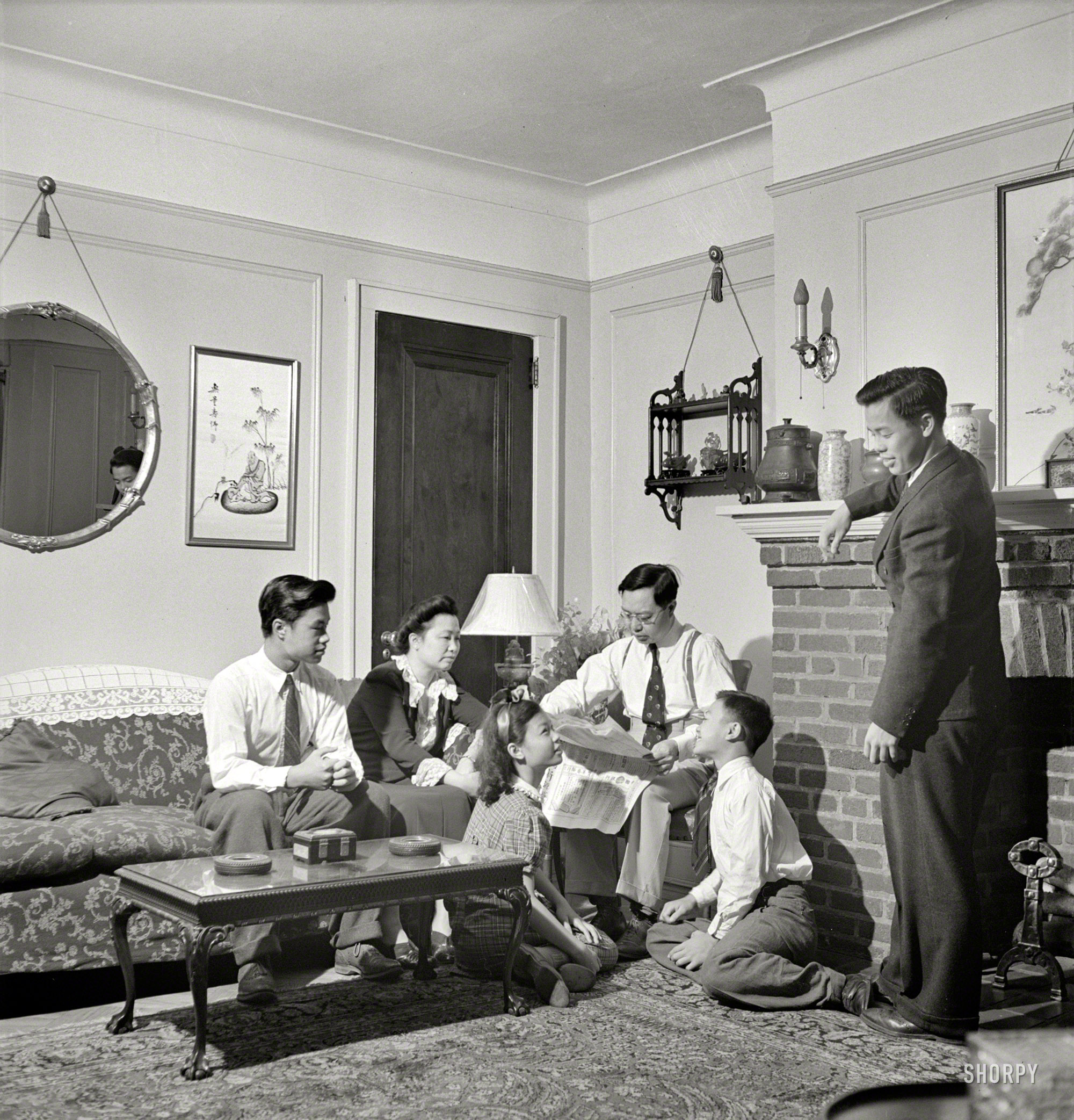 August 1942. "New York. Chinese-American family in their home in Flatbush." Back in Brooklyn with the boy we saw earlier here. Medium-format nitrate negative by Marjory Collins, Office of War Information. View full size.