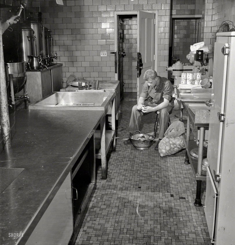 September 1942. Fort Belvoir, Va. "Army Sgt. George Camblair on kitchen police duty." Our first example of the more than 200 photos shot by Jack Delano documenting this soldier's induction, training and home life. View full size.
