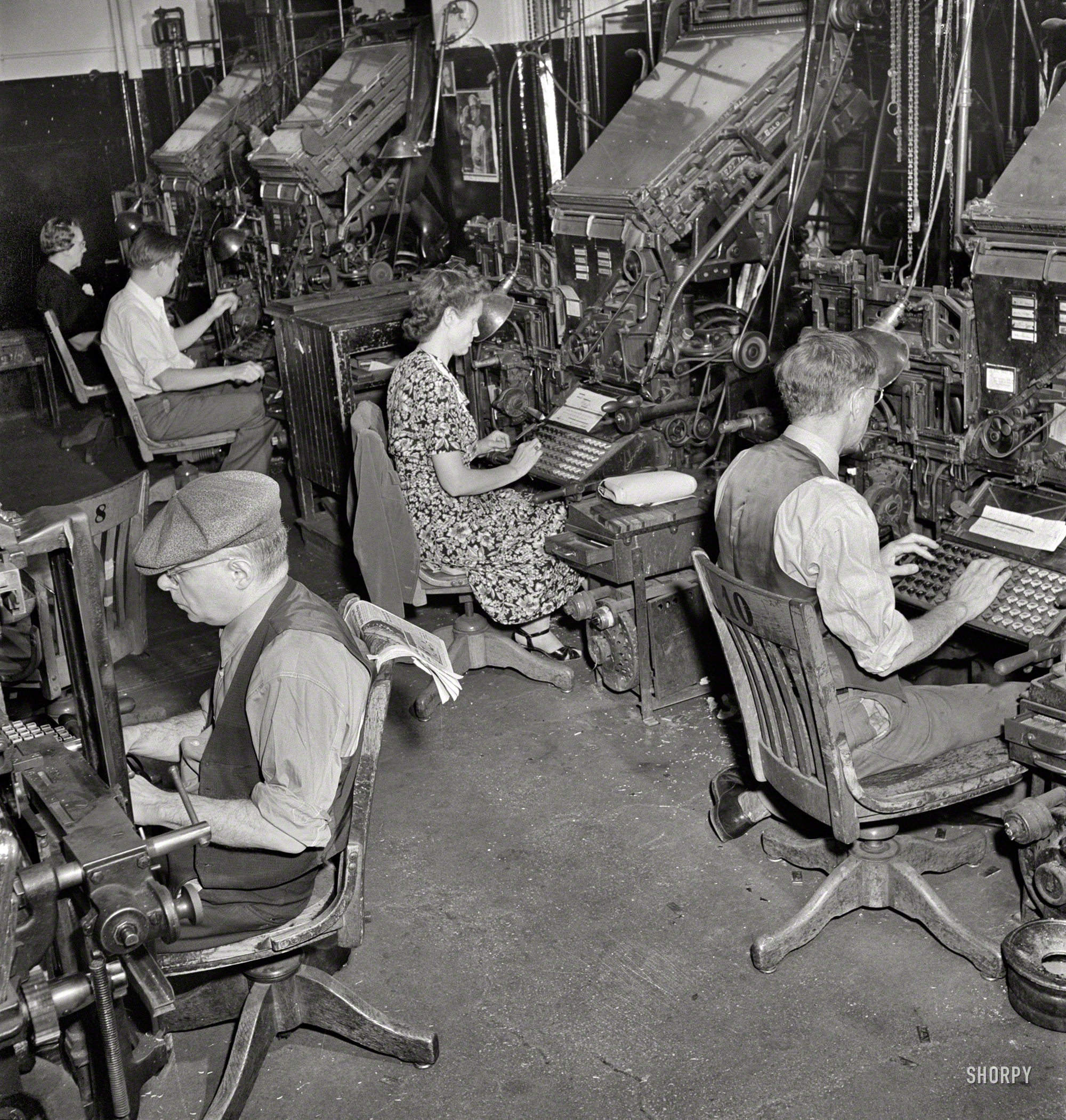 September 1942. "Linotype operators in composing room of the New York Times newspaper." These machines cast lines of type (Linotype) from molten lead prior to their assembly by compositors into the printing plates that go on the presses. Photo by Marjory Collins for the Office of War Information. View full size.