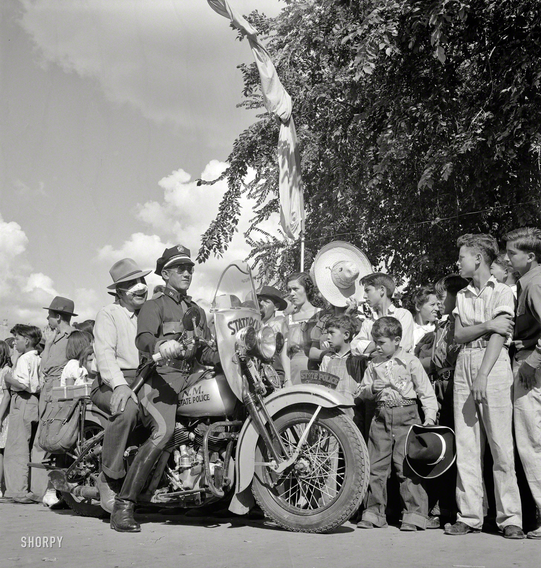 July 1940. "New Mexico State Police at Fiesta parade." Our second look at the festivities in Old Santa Fe. Photo by Russell Lee. View full size.