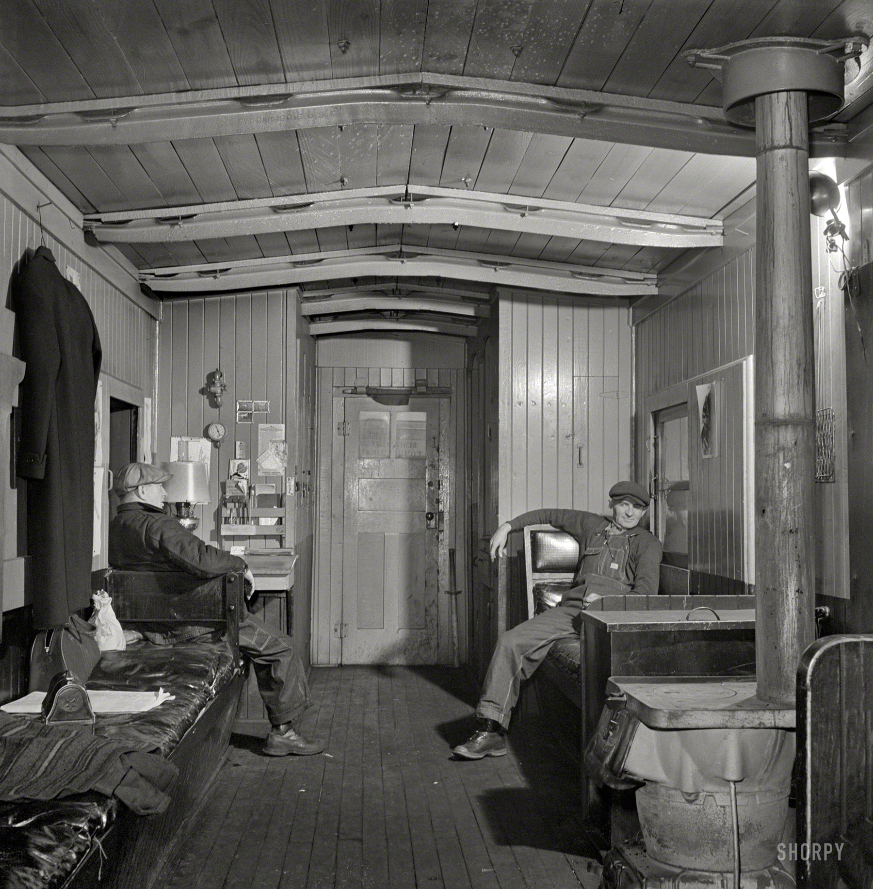 January 1943. "Freight operations on the Indiana Harbor Belt railroad between Chicago and Hammond, Indiana. Belt Line cabooses never go long distances or at very high speeds and are therefore constructed differently from line cabooses." Photo by Jack Delano for the Office of War Information. View full size.
