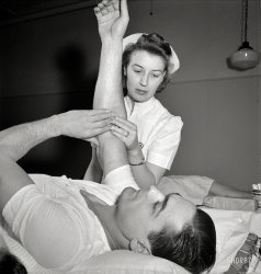 January 1943. New York. "Italian-American fireman giving pint of blood to the Red Cross." Photo by Marjory Collins, Office of War Information. View full size.