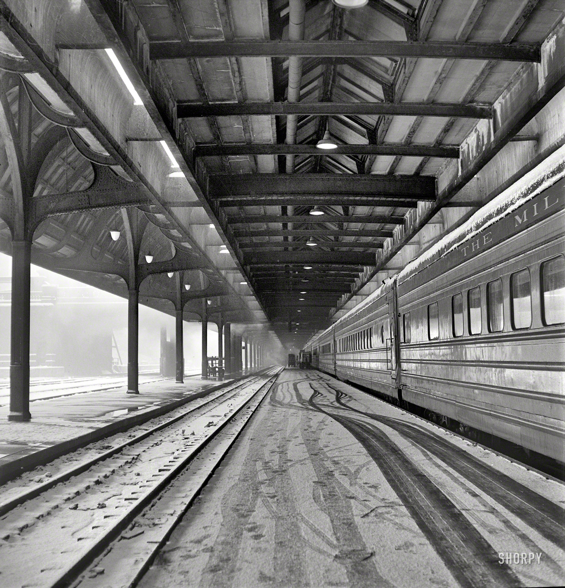 January 1943. "A Chicago, Milwaukee, Saint Paul & Pacific Railroad train just arrived at Chicago Union Station." Medium format nitrate negative by Jack Delano for the Office of War Information. View full size.