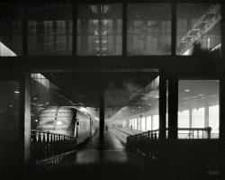 January 1943. "Chicago Union Station.  Streamliner 'Hiawatha' ready to depart the Chicago, Milwaukee, Saint Paul & Pacific platform on the north side of the station." Photo by Jack Delano, Office of War Information. View full size.