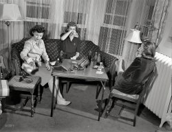 &nbsp; &nbsp; &nbsp; Time for our weekly check-in with the girls of Apartment 3G. (Or is it 3X?) Another round of Cokes, and let's get comfortable!

The next entry in a curious set of photos from the Office of War Information archive, taken by Arthur Siegel in the summer of 1941 in Detroit. View full size.