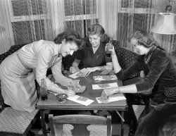 Detroit. "Summer 1941. Girls playing cards and drinking Coca-Cola." Which is how these things often begin. The first in a curious series of photos taken by Arthur Siegel for the Office of War Information. More to come. View full size.