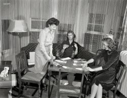 Detroit. "Summer 1941. Girls playing cards and drinking Coca-Cola." Our second look at a series of photos taken by Arthur Siegel for the Office of War Information. What game, exactly, are these girls up to? View full size.
